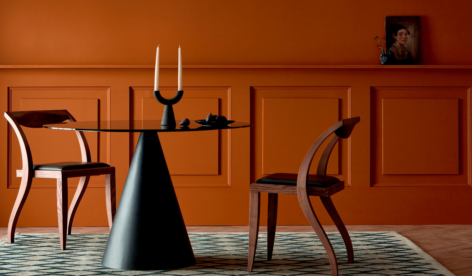 Bright orange paint on wall in dining area